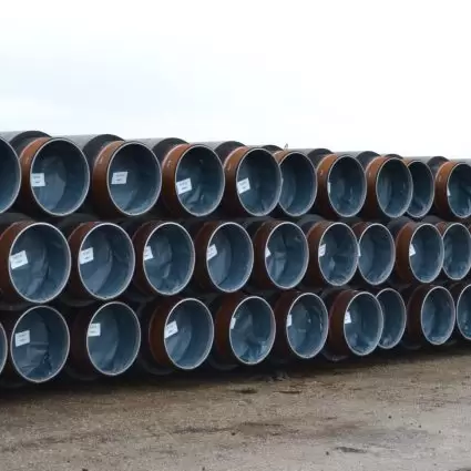 PVC Plug being used on stacked pipes, which prevents the inside of the pipe from the elements.